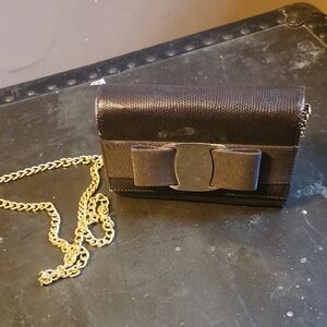 Black and Gold Clutch with Elegant Bow Detail
